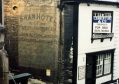 Advertisement on the Swan Hotel, Market Street, Bradford on Avon