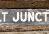 Holt Junction railway station sign