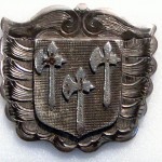 Hall's almshouse badge
